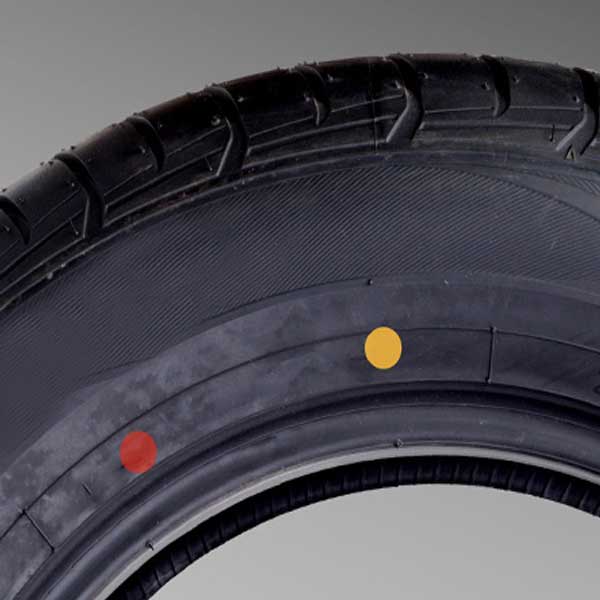 نقاط قرمز و زرد روی دیواره لاستیک